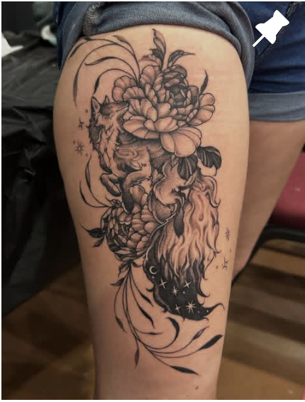 Floral animal tattoo